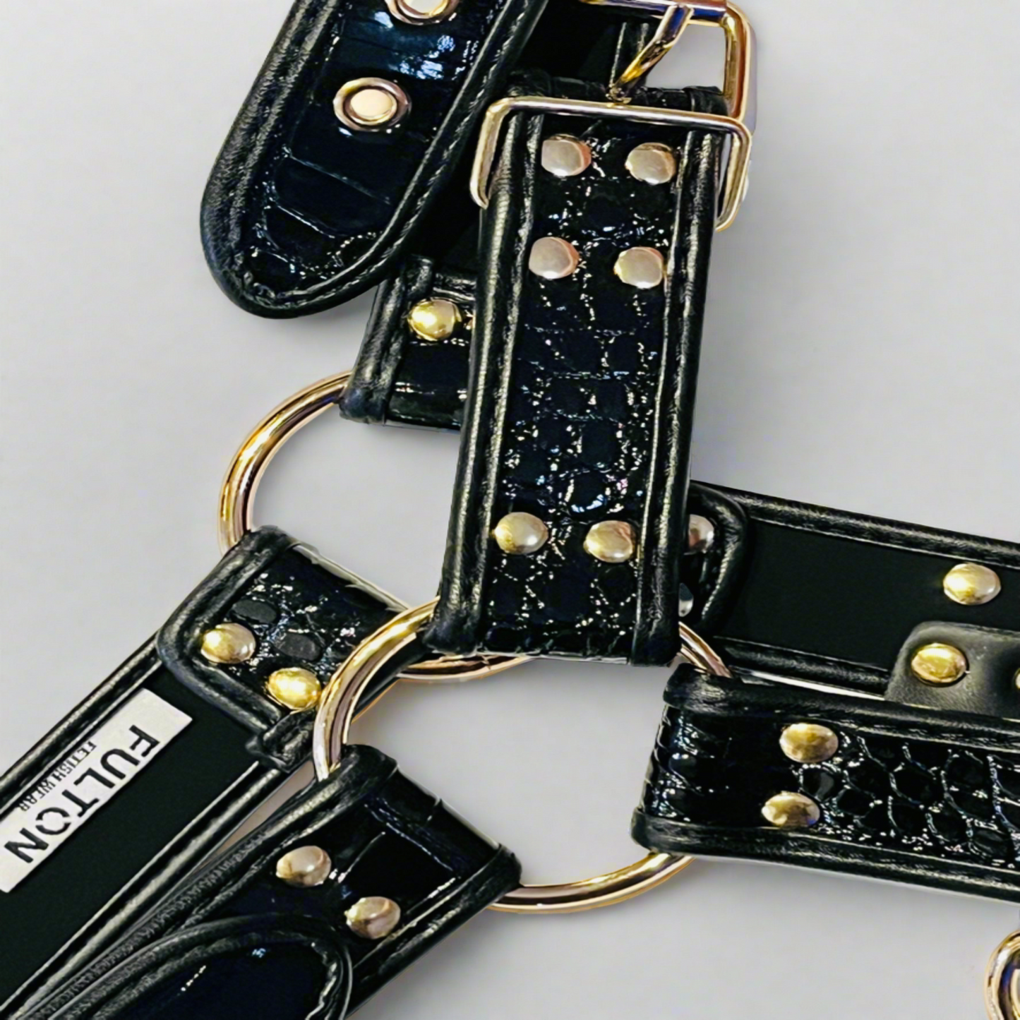 Black crocodile pu leather chest harness close up detail shot