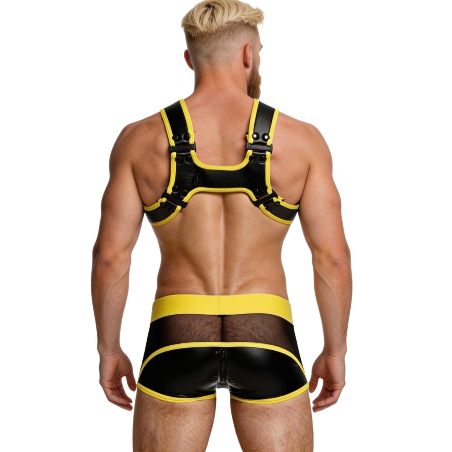 Man wearing a black and yellow harness and underwear set on a white background