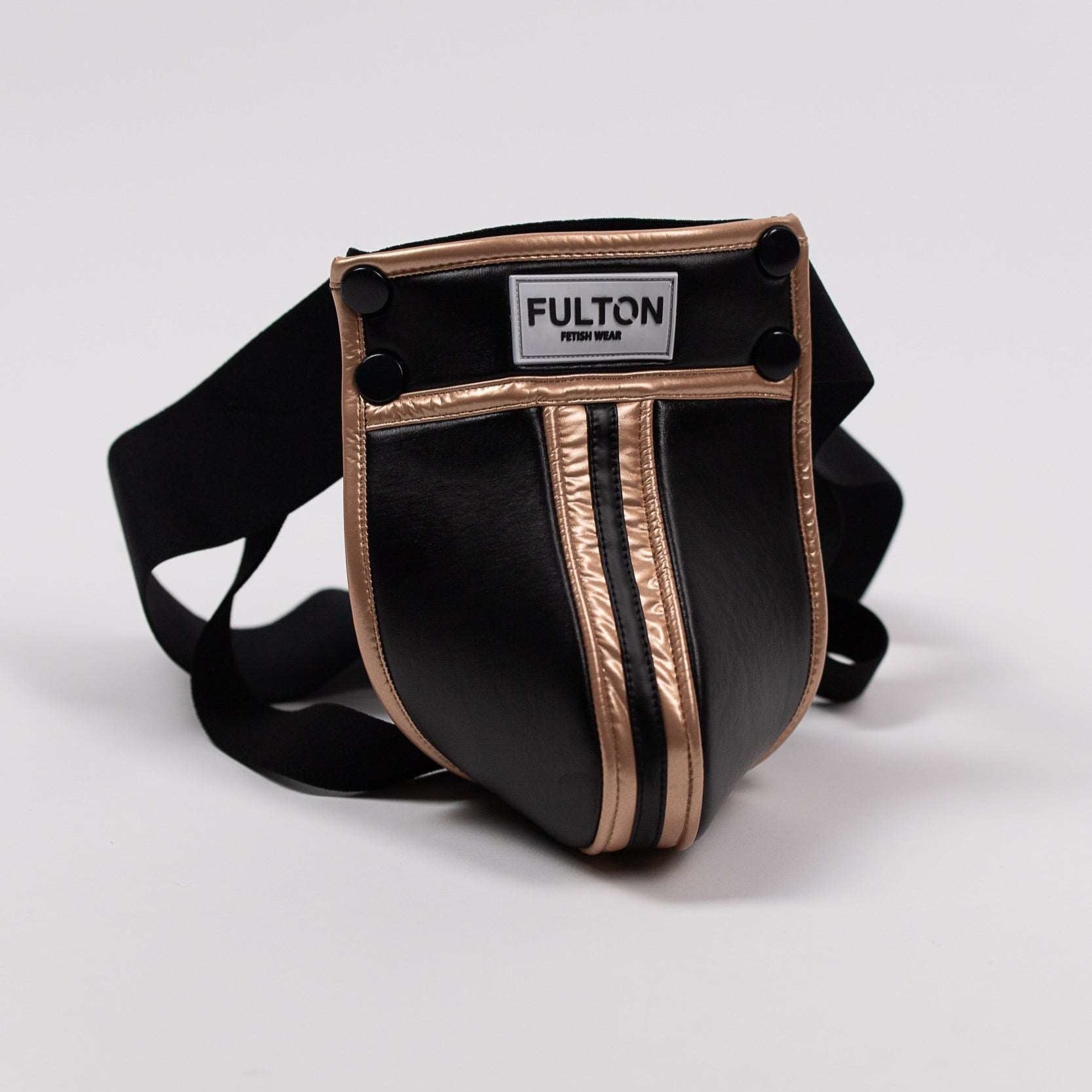 Front View - Close-up detail of gold metallic trim and black faux leather construction on jockstrap