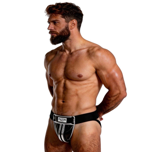 Muscular man wearing a black and silver athletic supporter on a white background