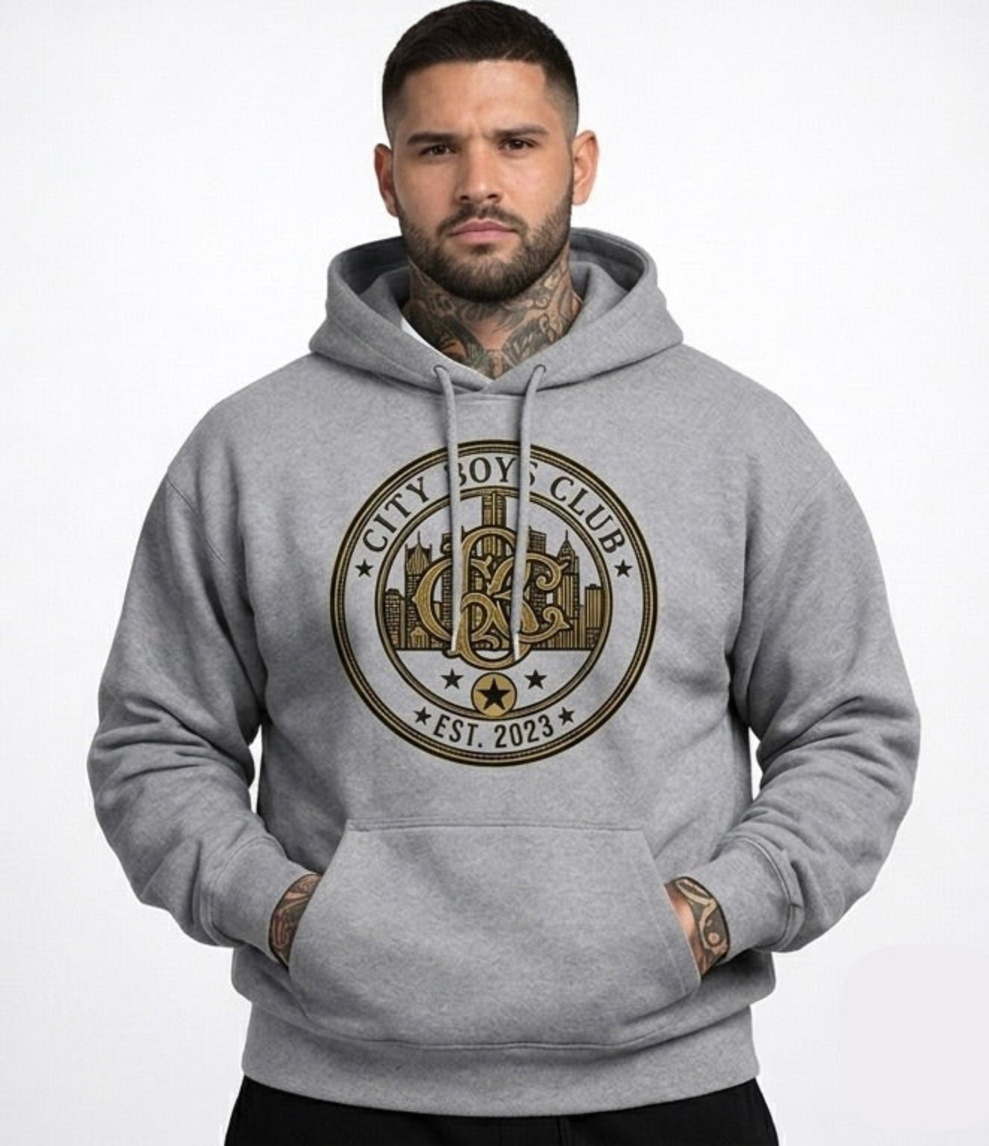 Man wearing a gray hoodie with a club logo on a white background