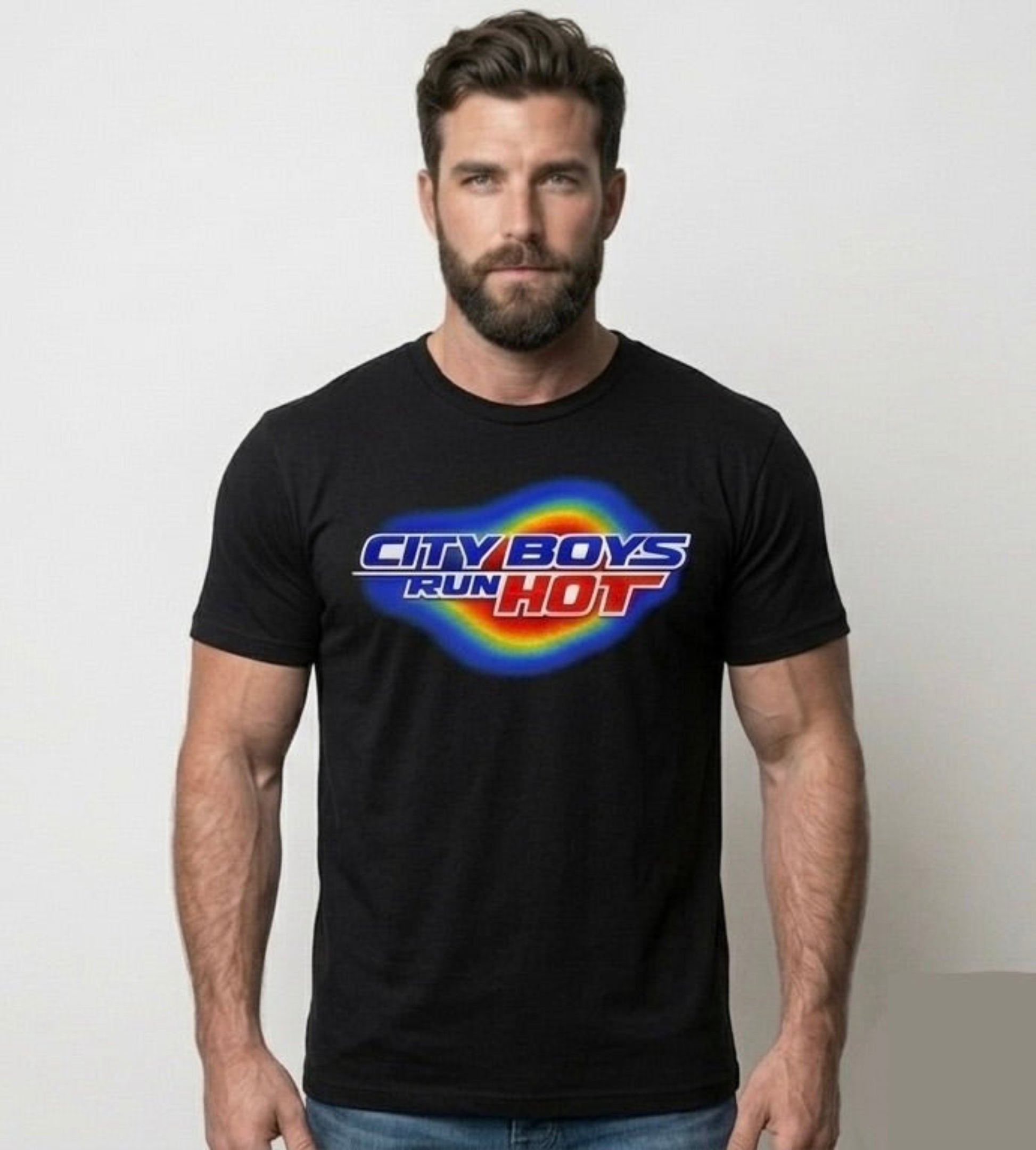 Man wearing a black t-shirt with colorful text design on a plain background