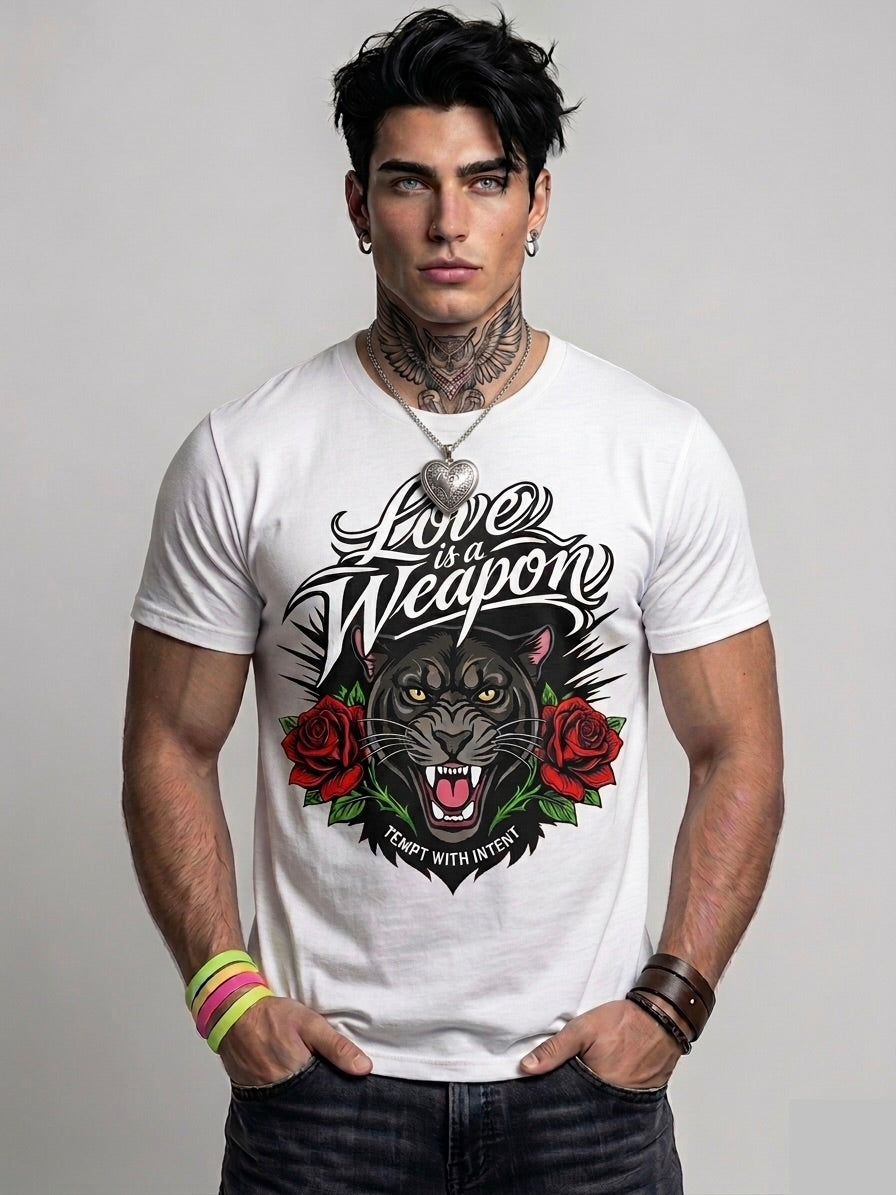 Man wearing a white t-shirt with a graphic design featuring a panther and roses, text 'Love is a Weapon', on a plain background.