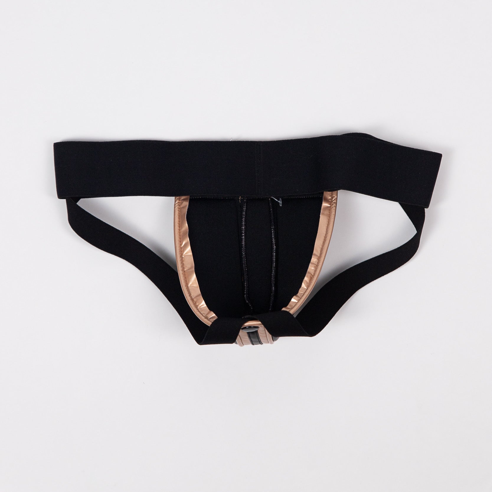 back detail view of gold metallic trim and faux black leather construction on jockstrap"