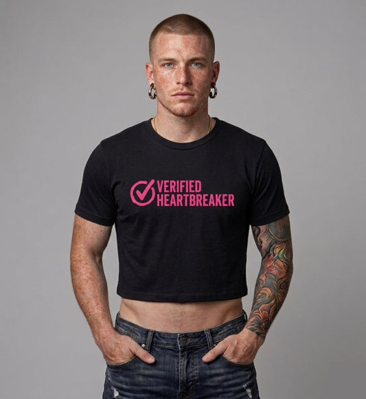 Man wearing a black t-shirt with 'Verified Heartbreaker' text on a gray background