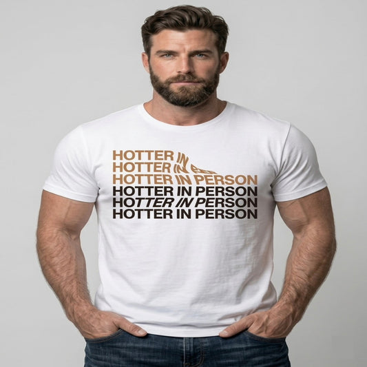 Man wearing a white t-shirt with text 'HOTTER IN PERSON' on a plain background