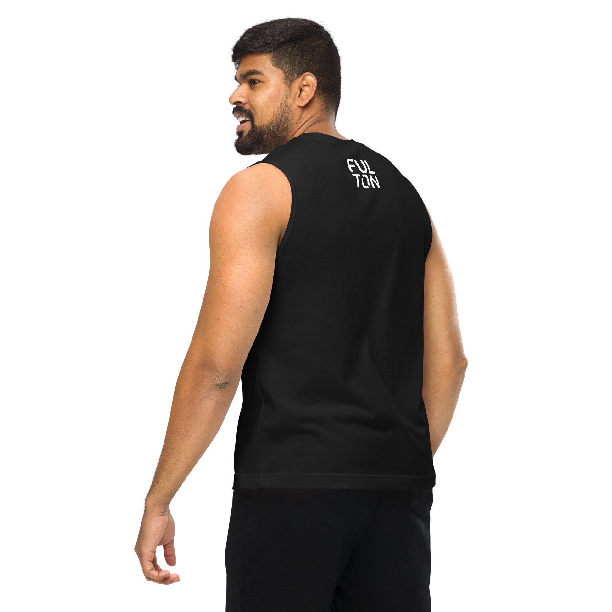 Man wearing a black sleeveless shirt with a logo on the back against a white background